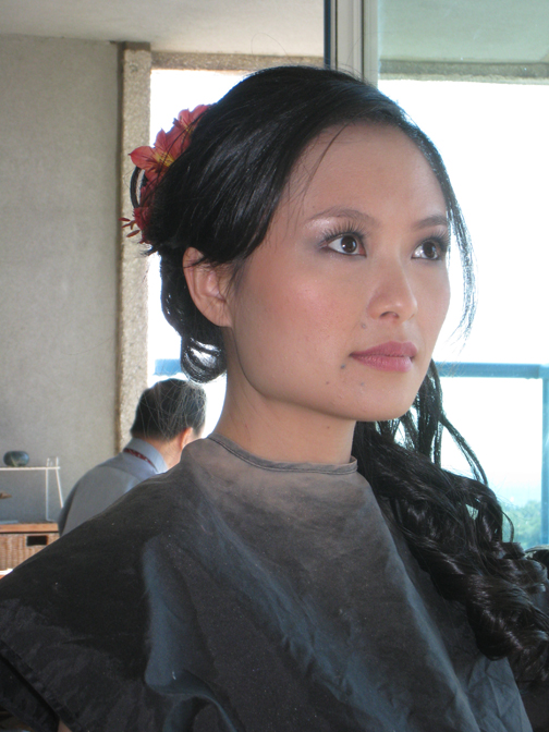 Makeup is done on the bride