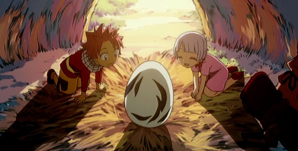 Lisanna and Natsu watching over an unhatched Happy